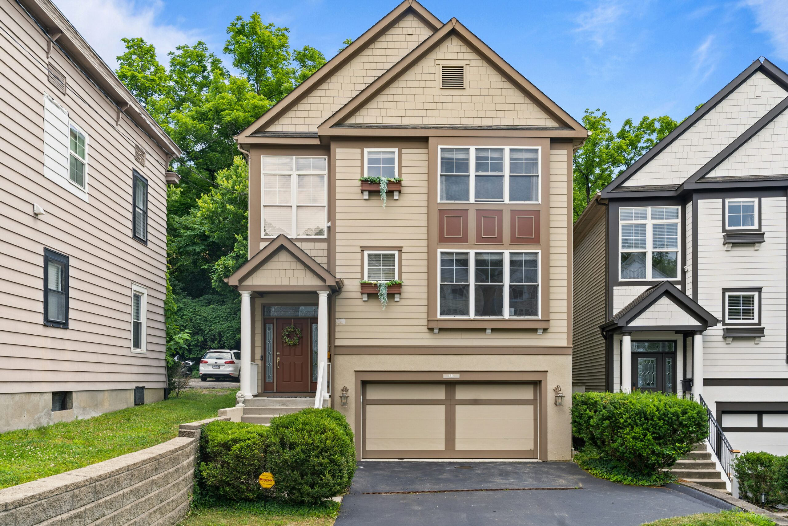 Suburban home with a for-sale vibe representing Maryland sellers facing higher mortgage rates